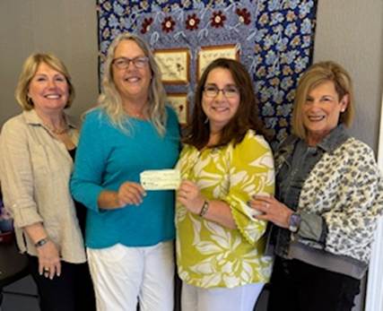 Ways and Means co-chair Colleen Lamberty, Terri Brown, HoH Executive Director Denise Melton, and co-chair Deni Donovan.